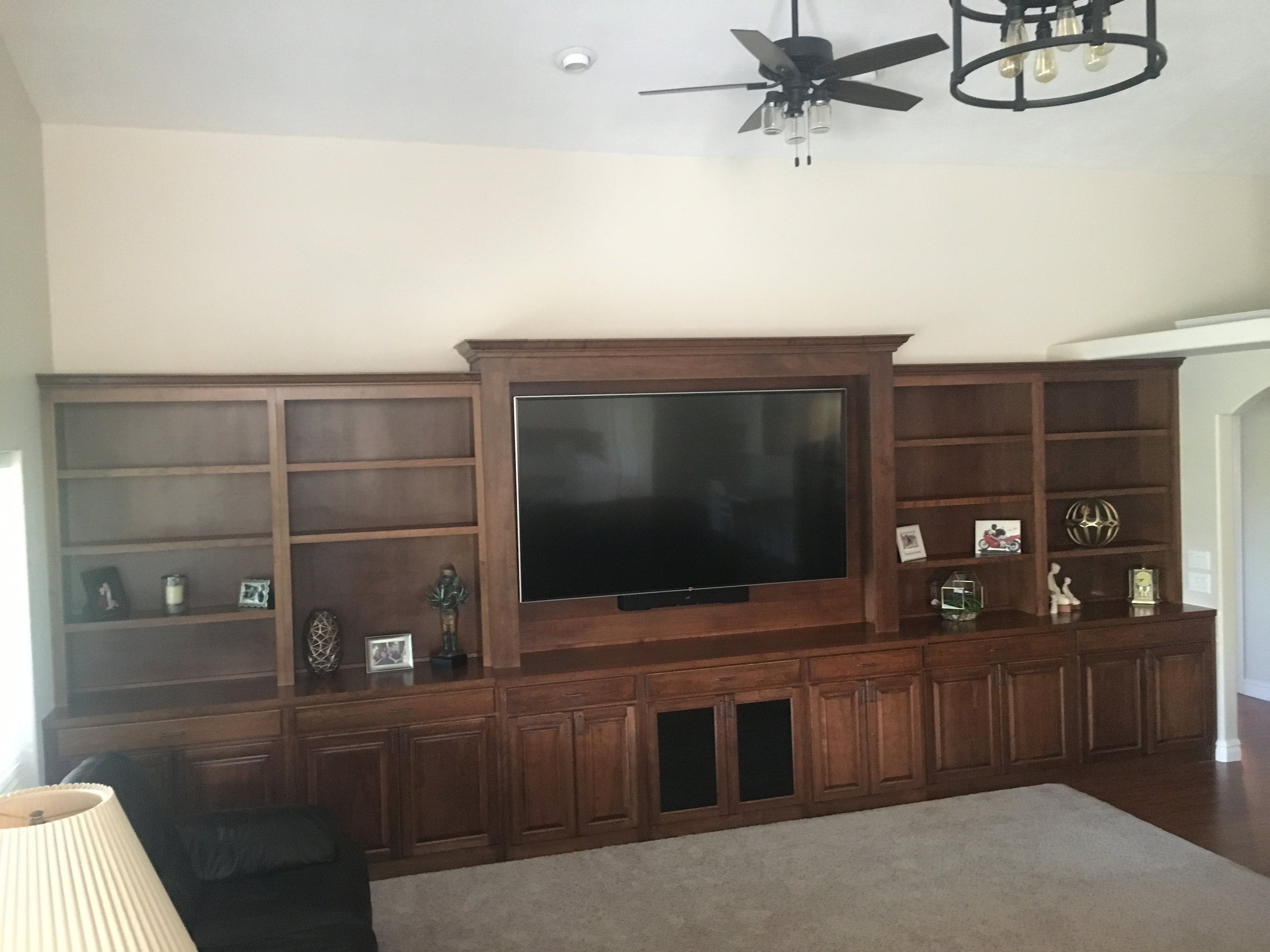 Wood entertainment center and media wall with custom shelving